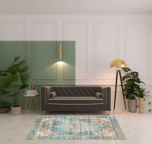 Orange Blue Teal Green And Beige Oriental Power Loom Stain Resistant Area Rug - 5' x 7'