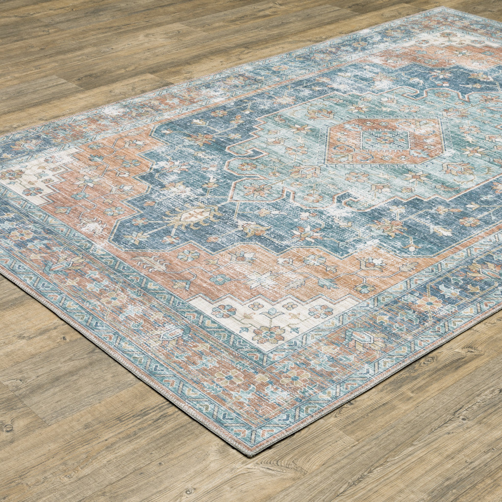 Orange Blue Teal Green And Beige Oriental Power Loom Stain Resistant Area Rug - 5' x 7'