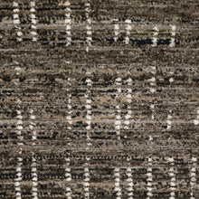 6' X 9' Charcoal Grey Grey Ivory Tan And Brown Abstract Power Loom Stain Resistant Area Rug