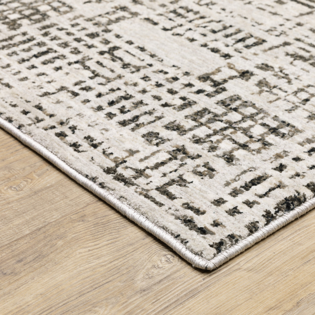 6' X 9' Ivory Grey Charcoal Brown And Beige Abstract Power Loom Stain Resistant Area Rug