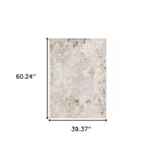 3' X 5' Beige Ivory Tan Grey And Brown Abstract Power Loom Stain Resistant Area Rug