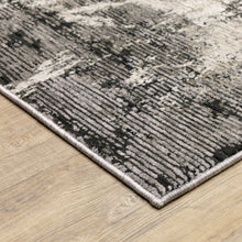 2' X 8' Grey Ivory Charcoal Tan Black And Beige Abstract Power Loom Stain Resistant Runner Rug