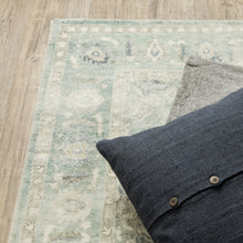 8' X 10' Green And Ivory Oriental Power Loom Stain Resistant Area Rug