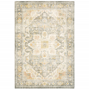 5' X 7' Grey Gold Orange And Ivory Oriental Power Loom Stain Resistant Area Rug