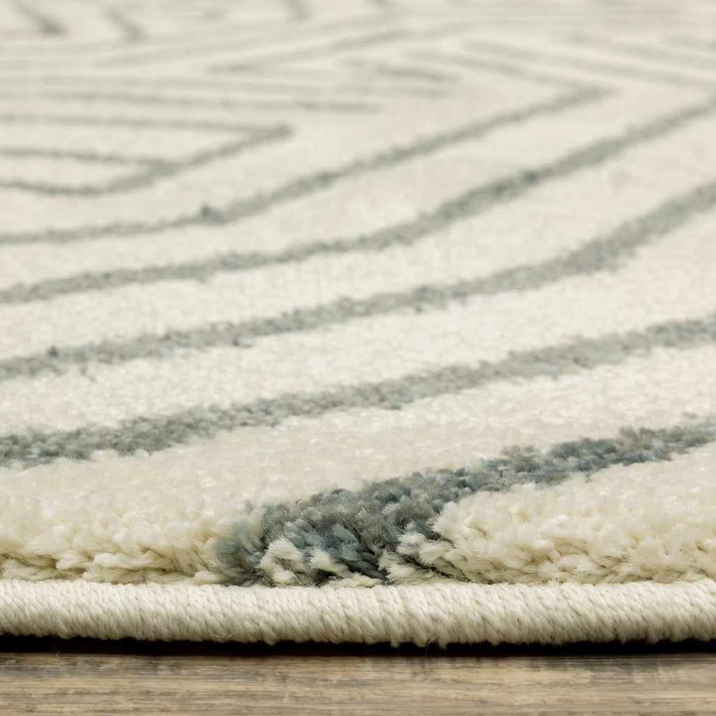 2' X 3' Beige Grey And Light Blue Geometric Power Loom Stain Resistant Area Rug