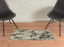 2' X 3' Grey Beige Charcoal And Blue Abstract Power Loom Stain Resistant Area Rug