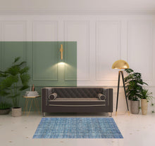 4' X 6' Blue And Brown Floral Power Loom Stain Resistant Area Rug