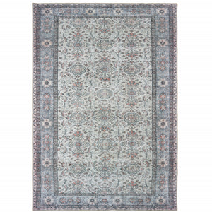 8' X 10' Ivory And Blue Oriental Power Loom Stain Resistant Area Rug