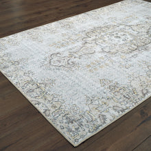 8' X 11' Grey And Gold Oriental Power Loom Stain Resistant Area Rug