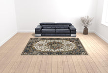 10' X 13' Beige Blue Green Rust And Grey Oriental Power Loom Stain Resistant Area Rug