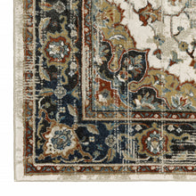 10' X 13' Beige Blue Green Rust And Grey Oriental Power Loom Stain Resistant Area Rug