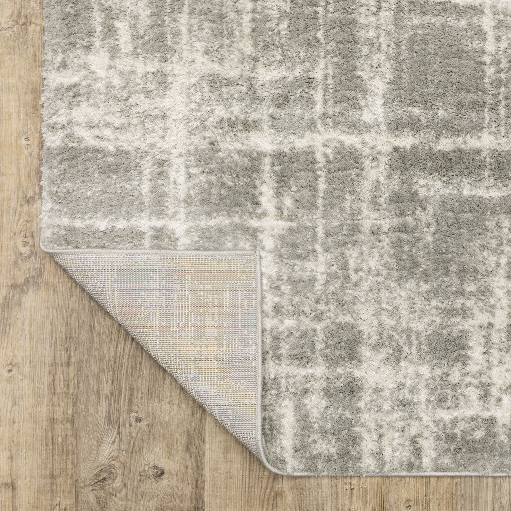 Grey And Ivory Abstract Shag Power Loom Stain Resistant Area Rug - 4' x 6'