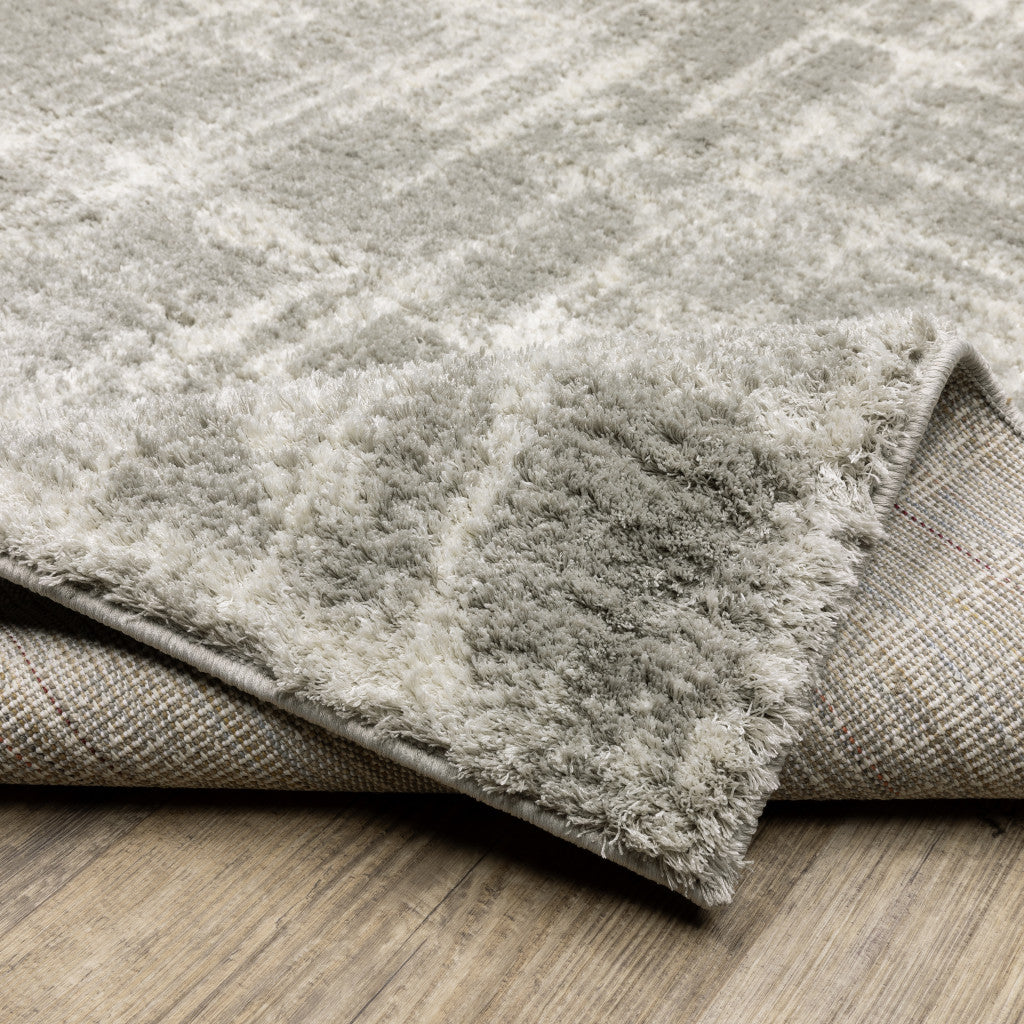 Grey And Ivory Abstract Shag Power Loom Stain Resistant Area Rug - 4' x 6'