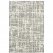 6' X 9' Grey And Ivory Abstract Shag Power Loom Stain Resistant Area Rug