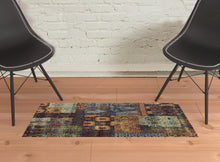 2' X 3' Gold Blue Purple Green And Red Abstract Power Loom Stain Resistant Area Rug