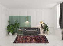 6' X 9' Red Purple Gold And Grey Oriental Power Loom Stain Resistant Area Rug