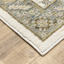 10' X 13' Stone Grey Ivory Green Brown Teal And Light Blue Oriental Power Loom Stain Resistant Area Rug