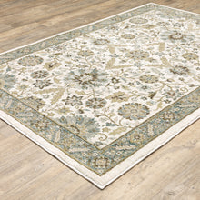 5' X 7' Stone Grey Ivory Green Brown Teal And Light Blue Oriental Power Loom Stain Resistant Area Rug