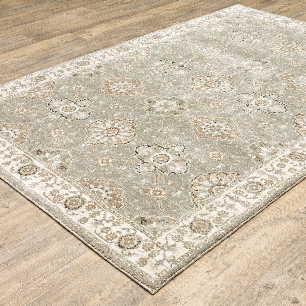 5' X 7' Grey Ivory Tan Brown And Gold Oriental Power Loom Stain Resistant Area Rug