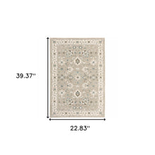 2' X 3' Beige Ivory Blue Green And Purple Oriental Power Loom Stain Resistant Area Rug