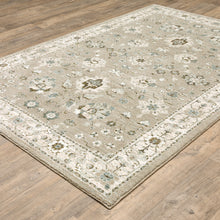 3' X 5' Beige Ivory Blue Green And Purple Oriental Power Loom Stain Resistant Area Rug