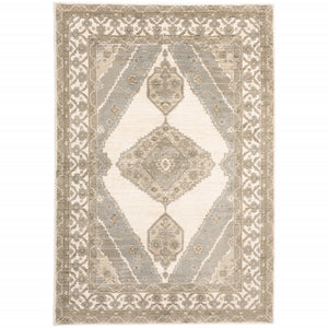 2' X 3' Beige And Ivory Oriental Power Loom Stain Resistant Area Rug