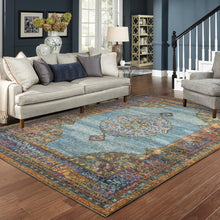 5' X 7' Blue Gold Green Red Orange And Purple Oriental Power Loom Stain Resistant Area Rug
