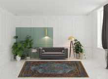 8' X 10' Blue Gold Green Red Orange And Purple Oriental Power Loom Stain Resistant Area Rug