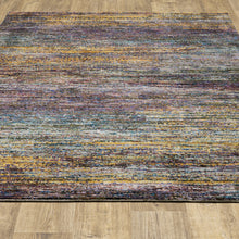 2' X 3' Blue Grey Gold Purple And Teal Abstract Power Loom Stain Resistant Area Rug