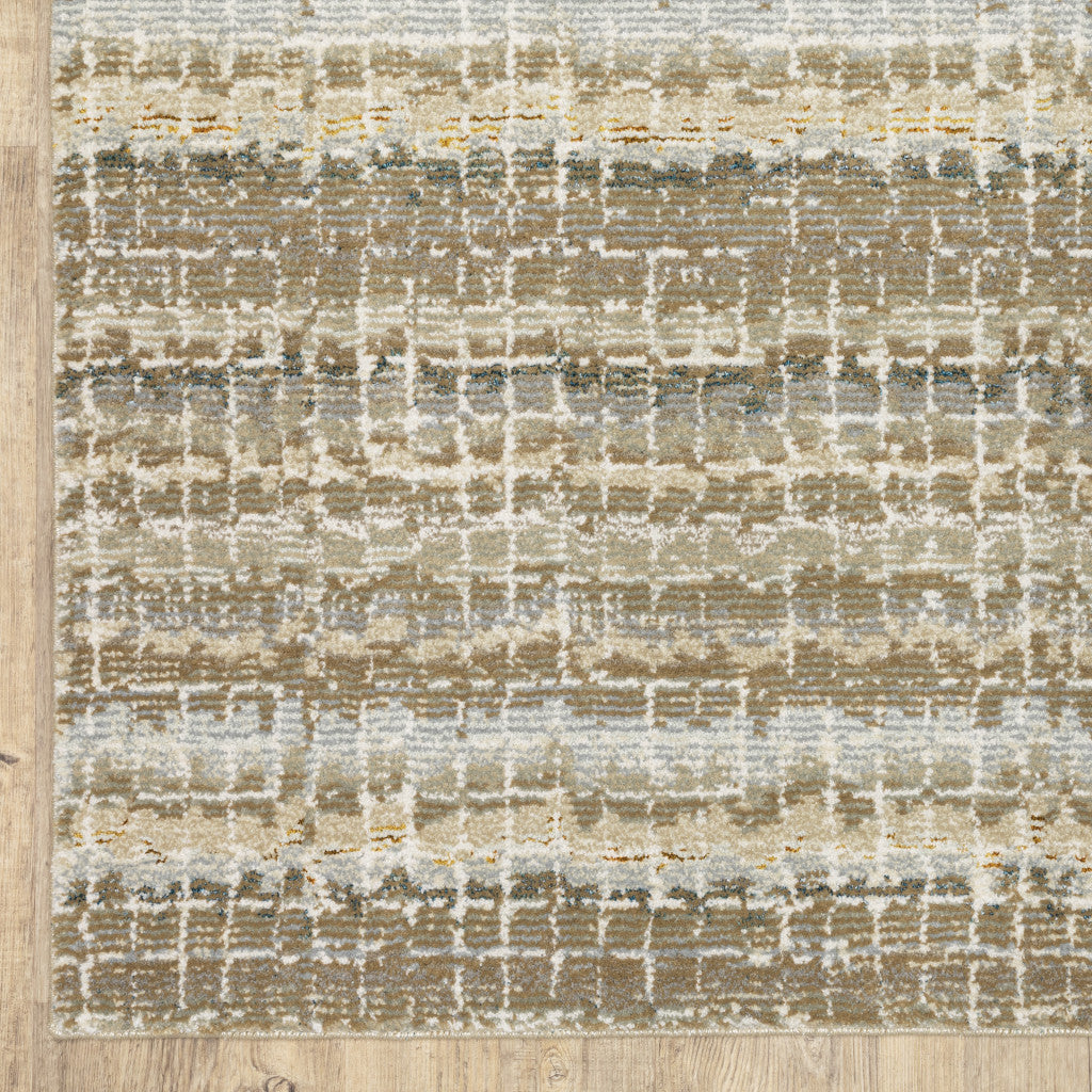 5' X 7' Ivory Grey Tan And Brown Abstract Power Loom Stain Resistant Area Rug