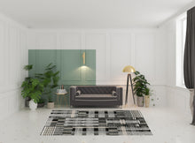 6' X 9' Black Grey And Ivory Geometric Power Loom Stain Resistant Area Rug