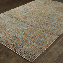 6' X 9' Silver Gold Rust And Blue Green Geometric Power Loom Stain Resistant Area Rug
