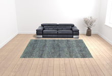10' X 13' Blue Grey Silver And Green Power Loom Stain Resistant Area Rug