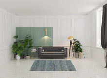 5' X 7' Blue Grey Silver And Green Power Loom Stain Resistant Area Rug