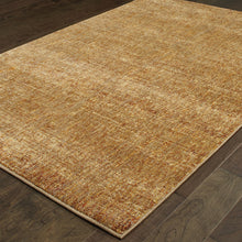 8' X 10' Gold Rust Brown Ivory Purple And Lavender Power Loom Stain Resistant Area Rug