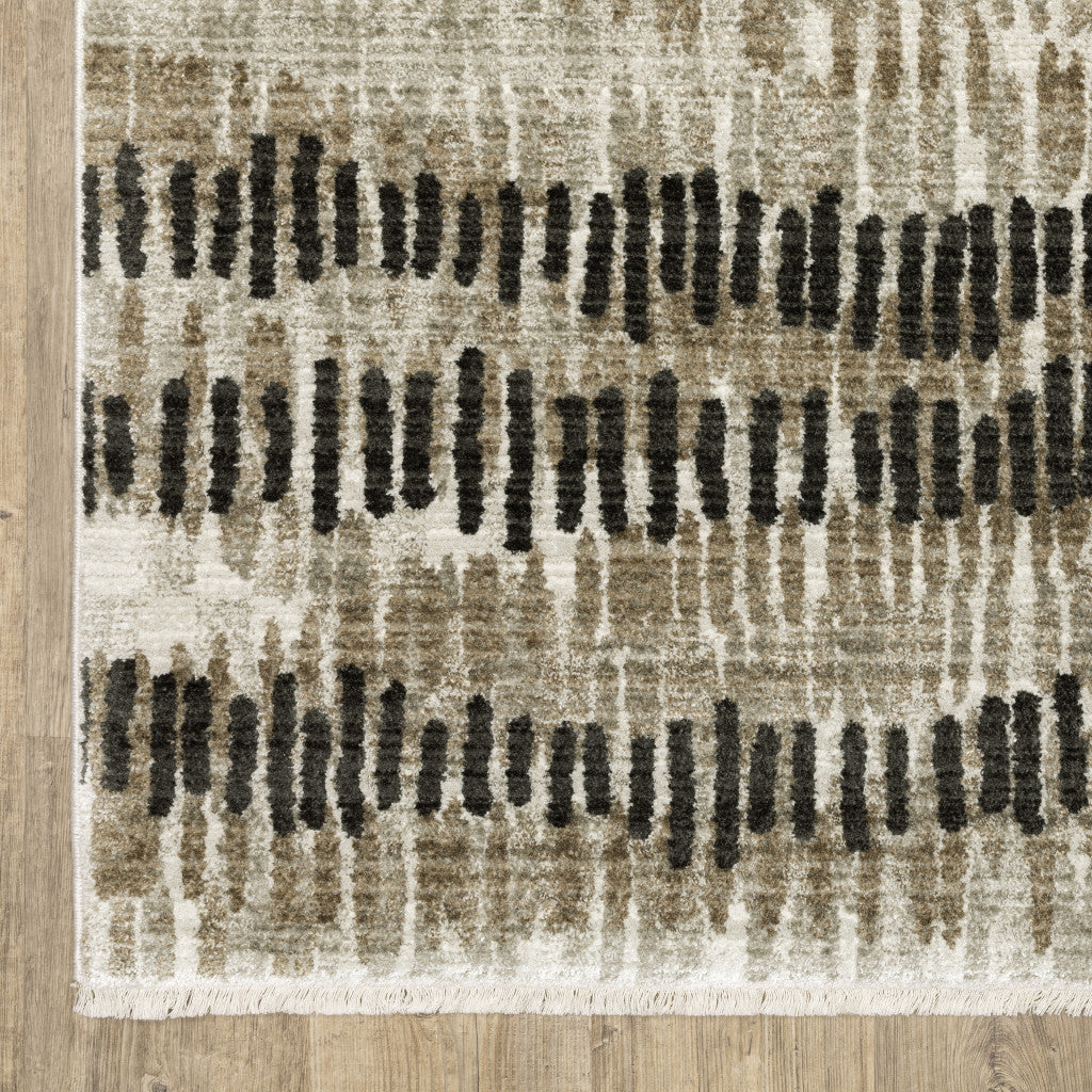 5' X 8' Beige Ivory Charcoal Brown Tan And Grey Abstract Power Loom Stain Resistant Area Rug With Fringe