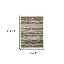 6' X 9' Beige Ivory Charcoal Brown Tan And Grey Abstract Power Loom Stain Resistant Area Rug With Fringe