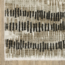 6' X 9' Beige Ivory Charcoal Brown Tan And Grey Abstract Power Loom Stain Resistant Area Rug With Fringe