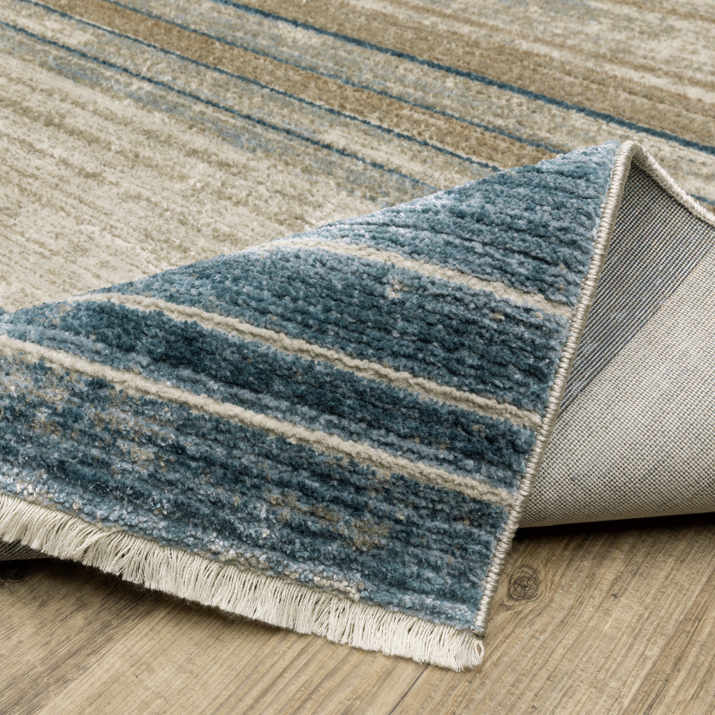 8' Blue Dark Blue Teal Grey Ivory Beige And Tan Geometric Power Loom Runner Rug With Fringe
