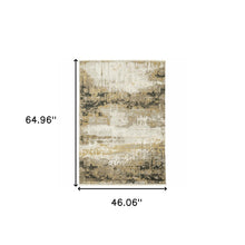 4' X 6' Grey Gold Black Charcoal And Beige Abstract Power Loom Stain Resistant Area Rug With Fringe