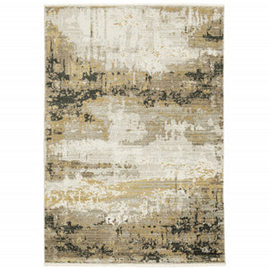 5' X 8' Grey Gold Black Charcoal And Beige Abstract Power Loom Stain Resistant Area Rug With Fringe