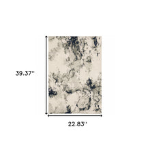 2' X 3' Grey Black And Ivory Abstract Power Loom Stain Resistant Area Rug