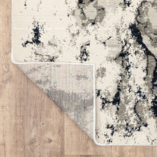 2' X 8' Grey Black And Ivory Abstract Power Loom Stain Resistant Runner Rug