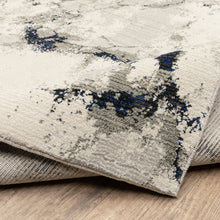 2' X 8' Grey Black And Ivory Abstract Power Loom Stain Resistant Runner Rug