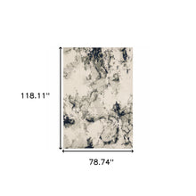 6' X 9' Grey Black And Ivory Abstract Power Loom Stain Resistant Area Rug