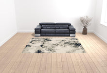 9' X 12' Grey Black And Ivory Abstract Power Loom Stain Resistant Area Rug