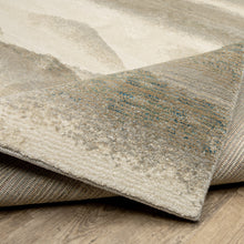 9' X 12' Grey Blue And Teal Abstract Power Loom Stain Resistant Area Rug