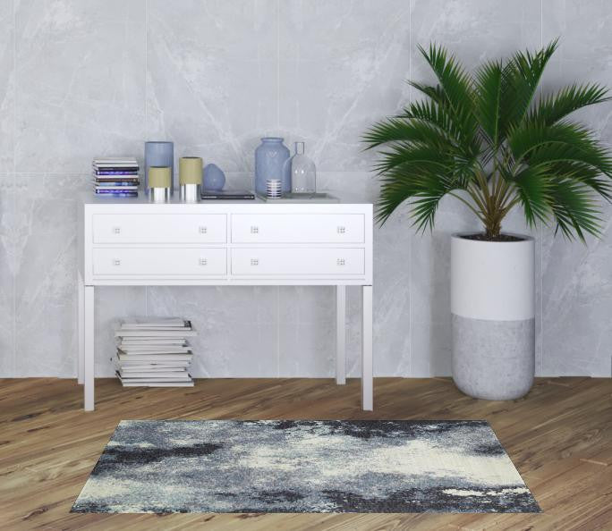 3' X 5' Navy And Ivory Abstract Power Loom Stain Resistant Area Rug