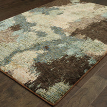 5' X 7' Blue And Brown Abstract Power Loom Stain Resistant Area Rug