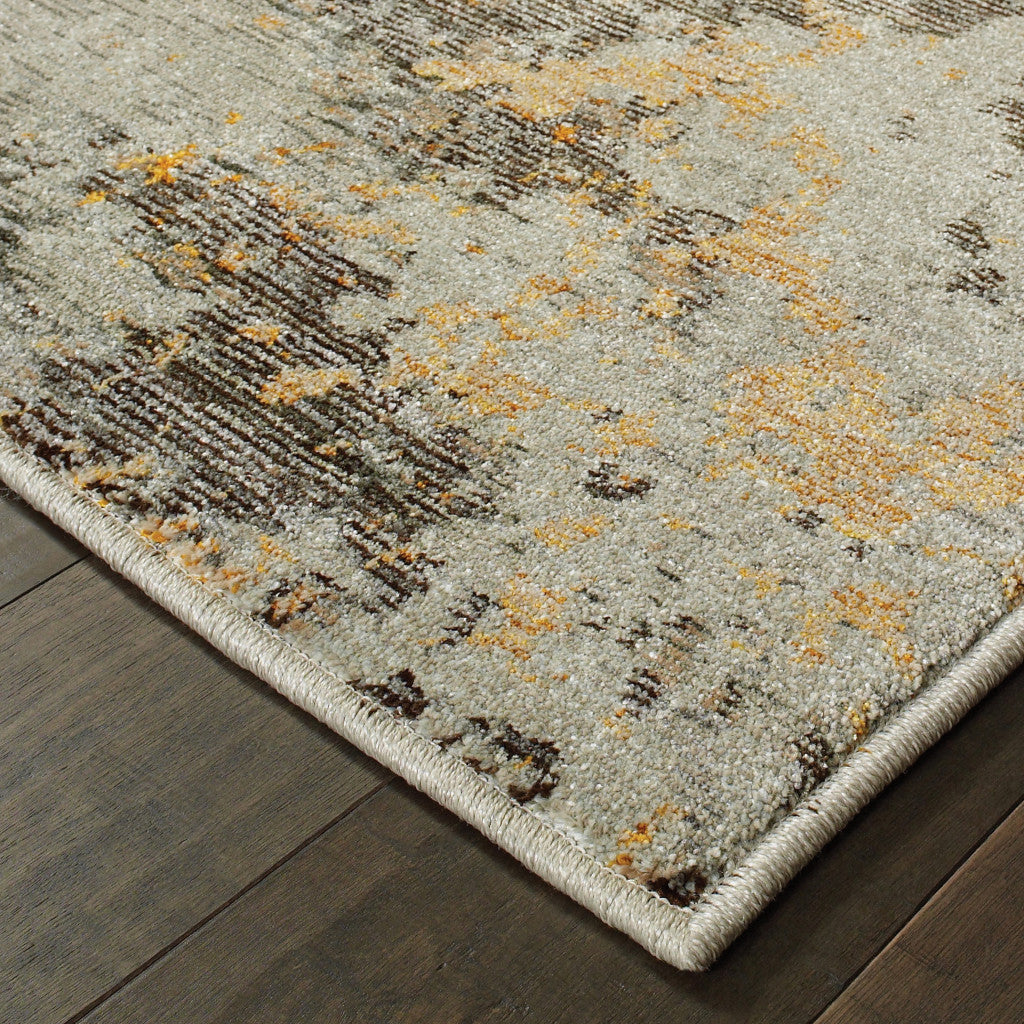 2' X 3' Grey And Gold Abstract Power Loom Stain Resistant Area Rug